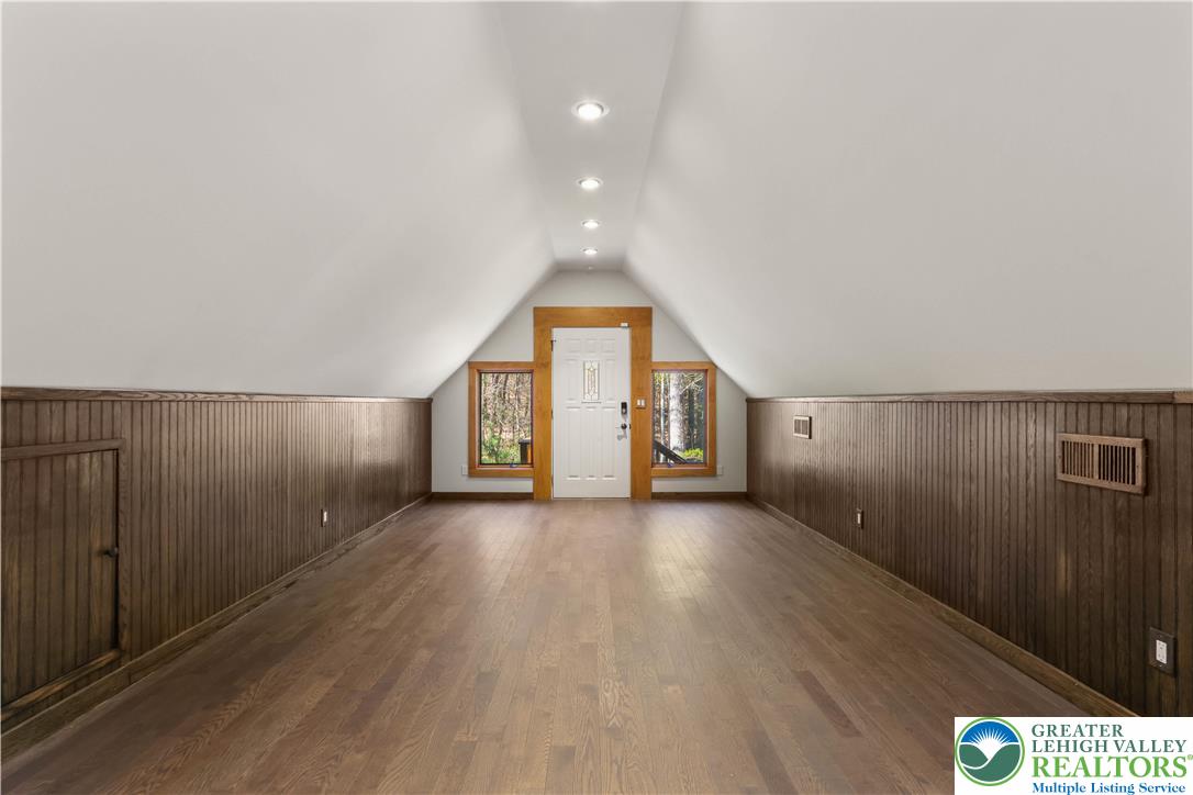 376 H T Y Road Kunkletown, PA 18058 - Photo 74 of 80 an empty room with wooden floor and windows