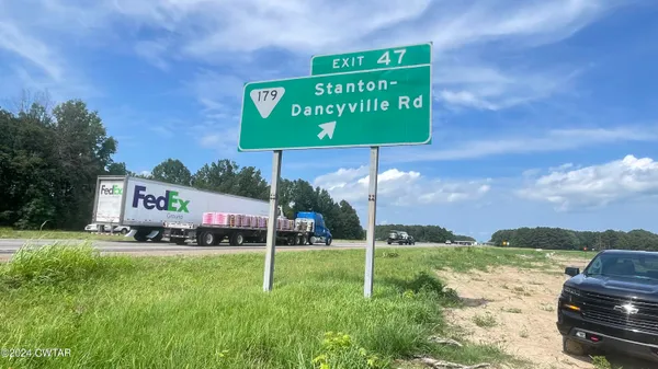 a sign on the side of the road