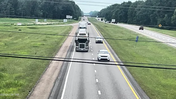 a view of outdoor space with swimming pool