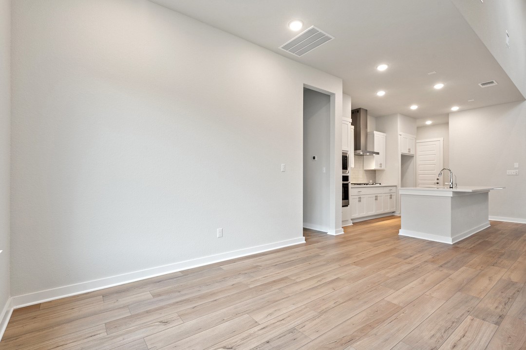 101 Old Wds Road Liberty Hill, TX 78642 - Photo 14 of 40 a view of kitchen with wooden floor