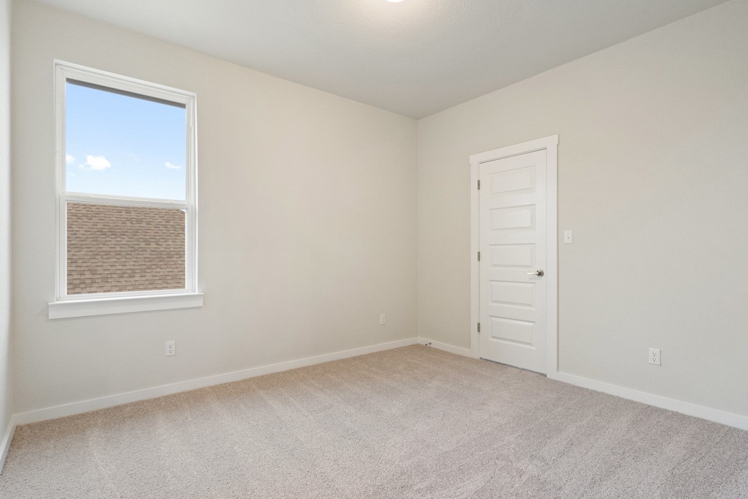 101 Old Wds Road Liberty Hill, TX 78642 - Photo 34 of 40 an empty room with windows and closet