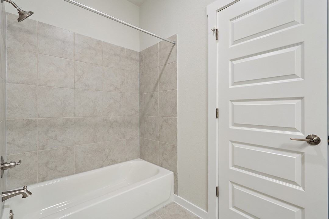 101 Old Wds Road Liberty Hill, TX 78642 - Photo 36 of 40 a bathroom with a bathtub and shower