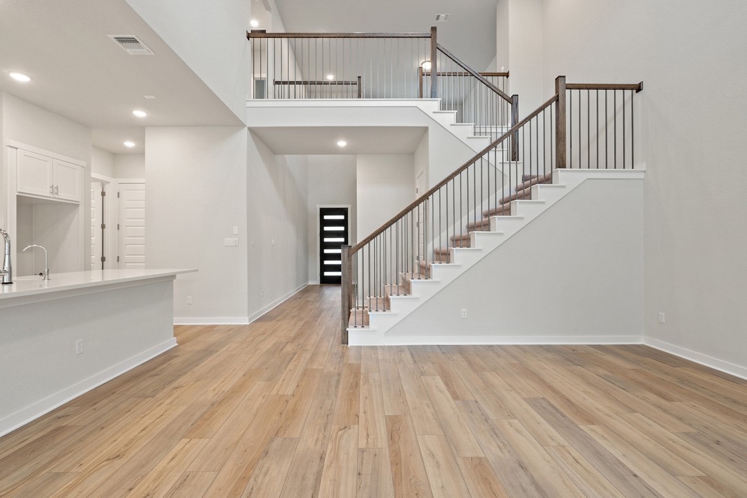 101 Old Wds Road Liberty Hill, TX 78642 - Photo 6 of 40 a view of entryway and hall with wooden floor