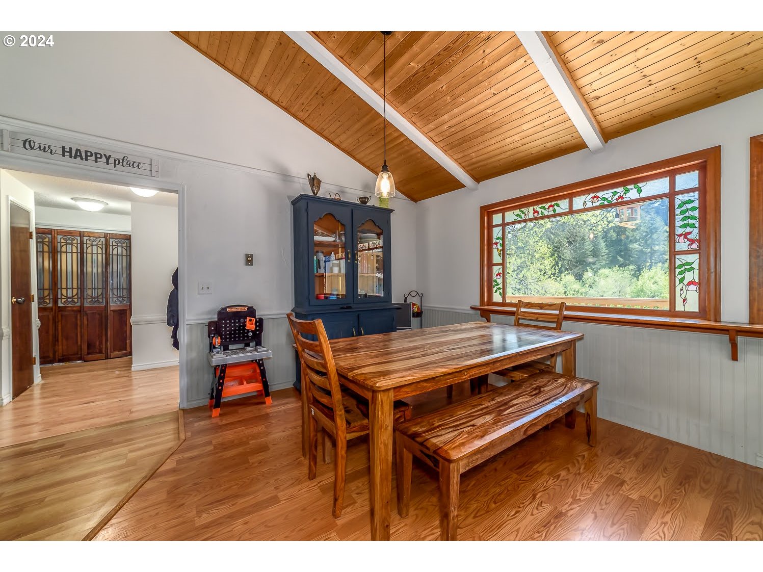 28149 Briggs Hill Road Eugene, OR 97405 - Photo 14 of 37 a room with furniture and wooden floor