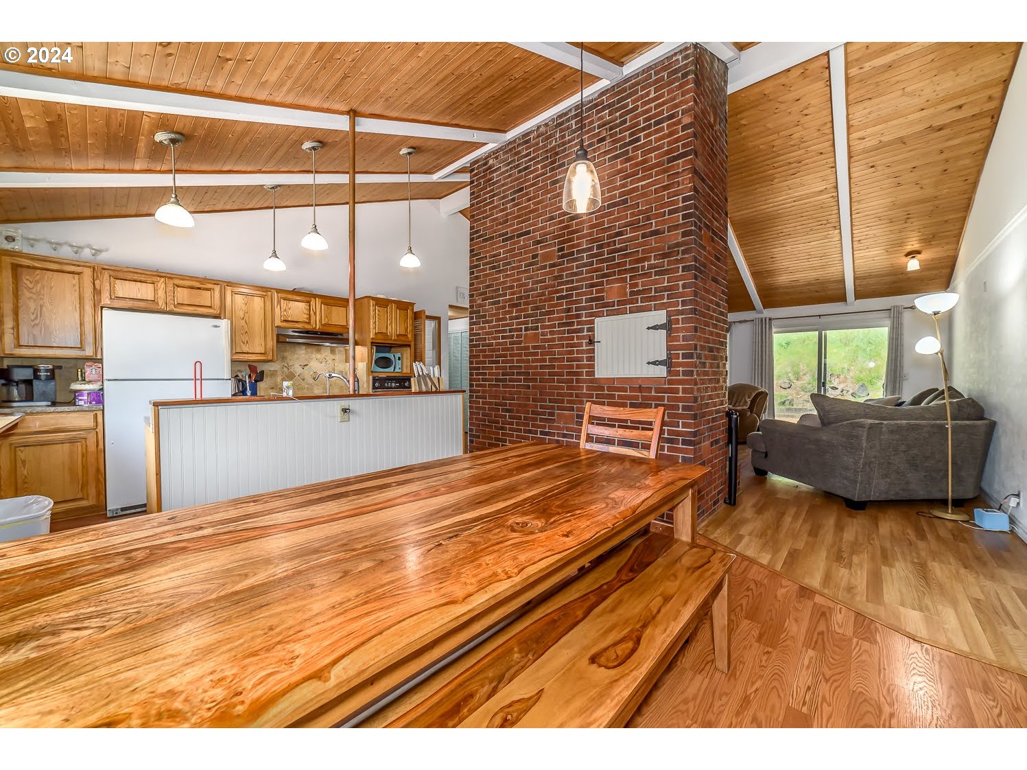 28149 Briggs Hill Road Eugene, OR 97405 - Photo 16 of 37 a view of a living room with a large kitchen