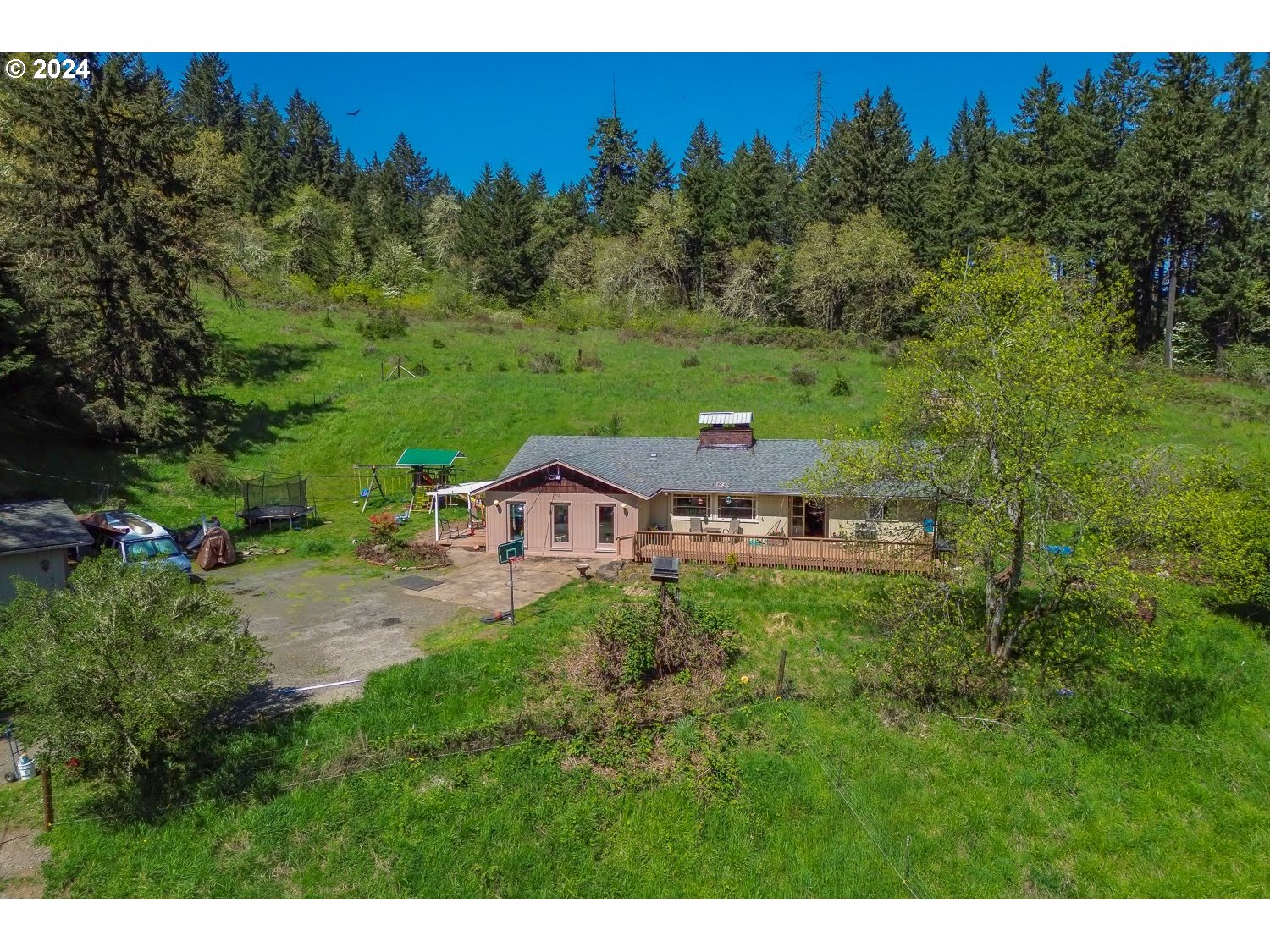 28149 Briggs Hill Road Eugene, OR 97405 - Photo 2 of 37 a view of a house with a big yard