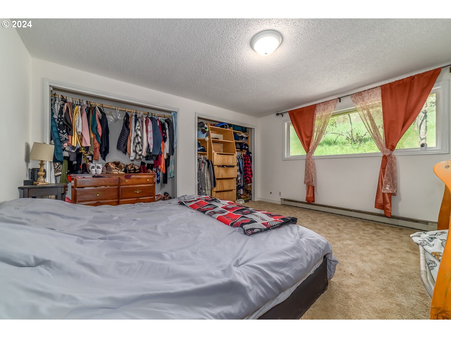 28149 Briggs Hill Road Eugene, OR 97405 - Photo 21 of 37 a bedroom with bed and window