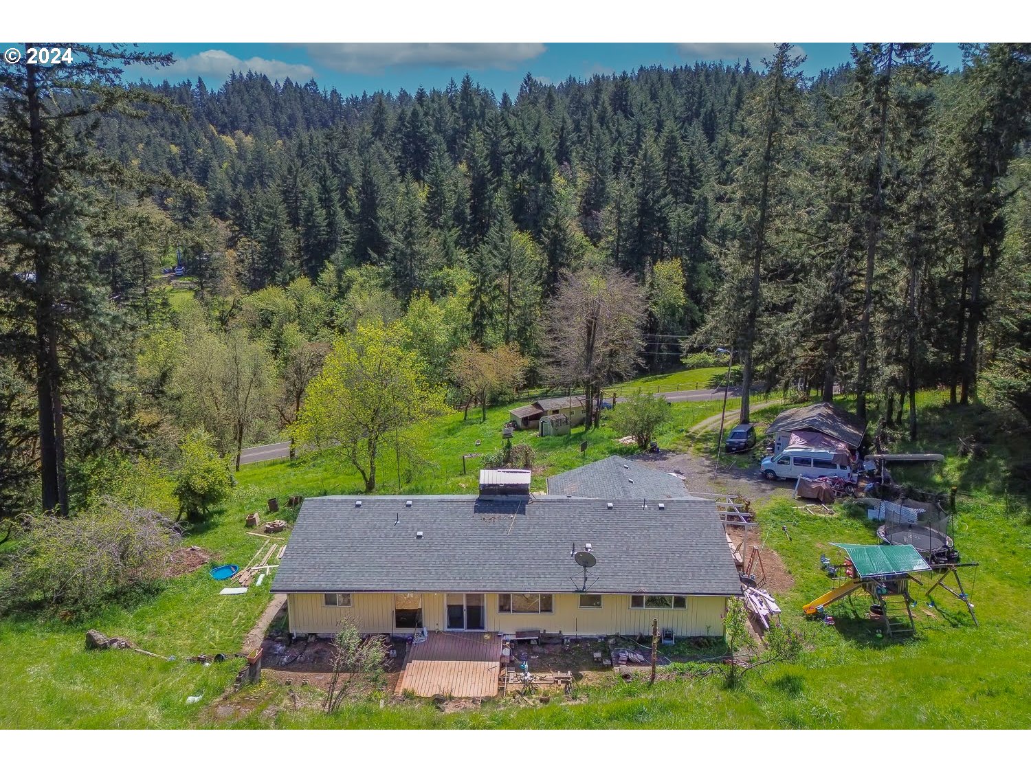 28149 Briggs Hill Road Eugene, OR 97405 - Photo 33 of 37 an aerial view of a house with yard