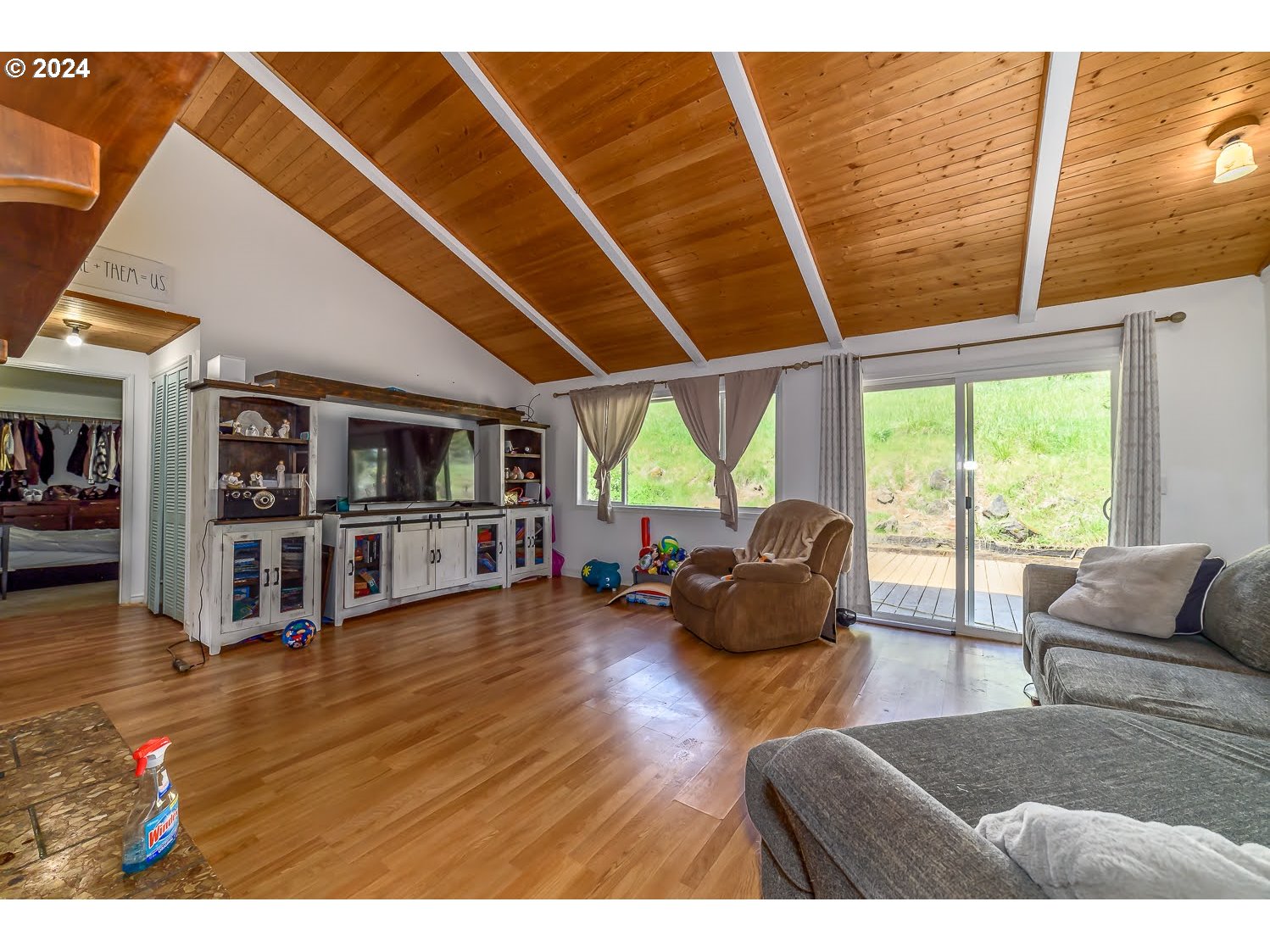 28149 Briggs Hill Road Eugene, OR 97405 - Photo 9 of 37 a living room with furniture and a large window
