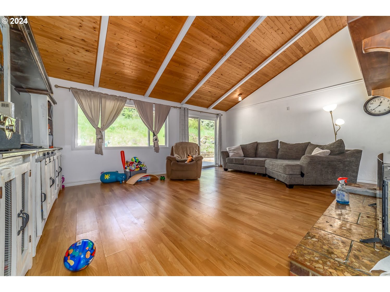 28149 Briggs Hill Road Eugene, OR 97405 - Photo 10 of 37 a living room with furniture and a wooden floor