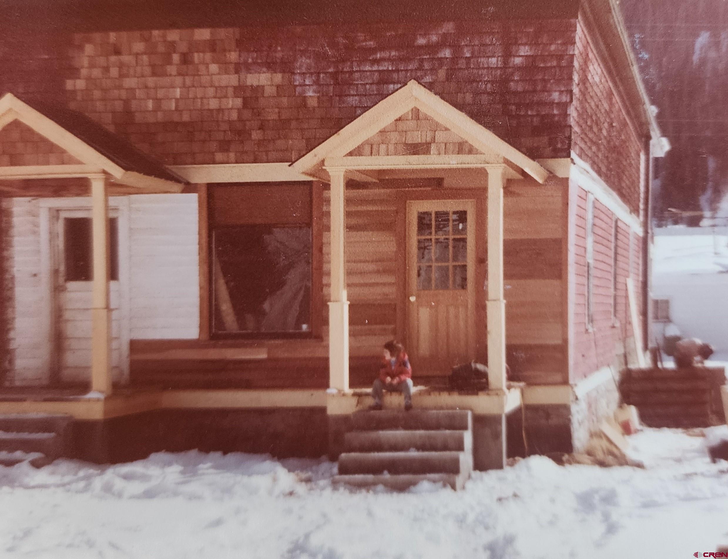 754 Greene Street, Unit A B C D Silverton, CO 81433 - Photo 29 of 31 a front view of a house with a yard