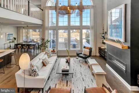 a large kitchen with stainless steel appliances kitchen island granite countertop a large counter top