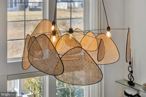 a spacious bedroom with a large bed and a dresser