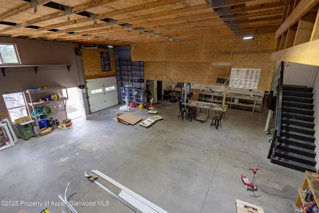 a view of a garage with storage
