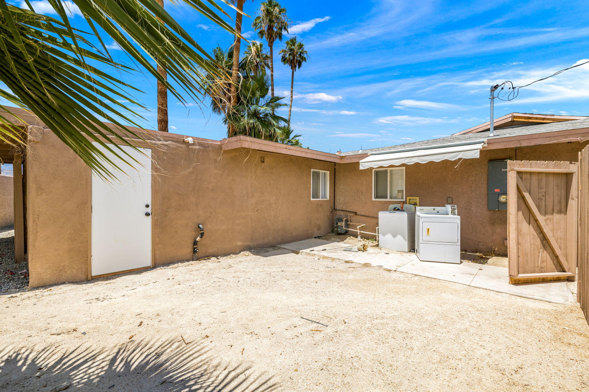 44510 San Carlos Avenue, Unit 4 Palm Desert, CA 92260 - Photo 11 of 12 a view of a house with a snow