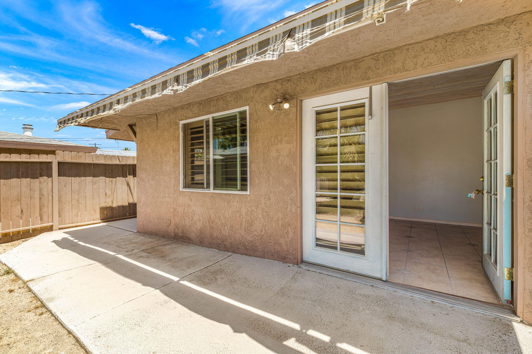 44510 San Carlos Avenue, Unit 4 Palm Desert, CA 92260 - Photo 2 of 12 a view of backyard with a balcony