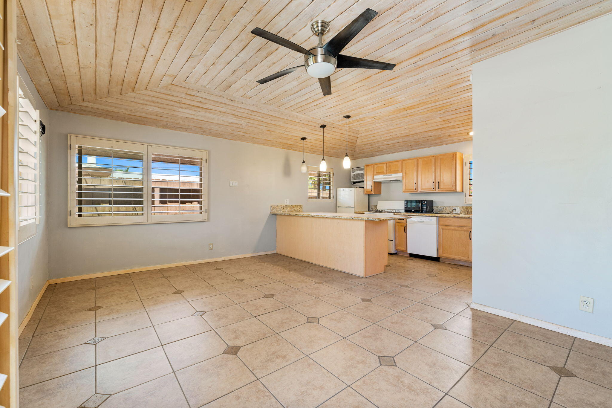 44510 San Carlos Avenue, Unit 4 Palm Desert, CA 92260 - Photo 4 of 12 a view of a kitchen with electric appliances