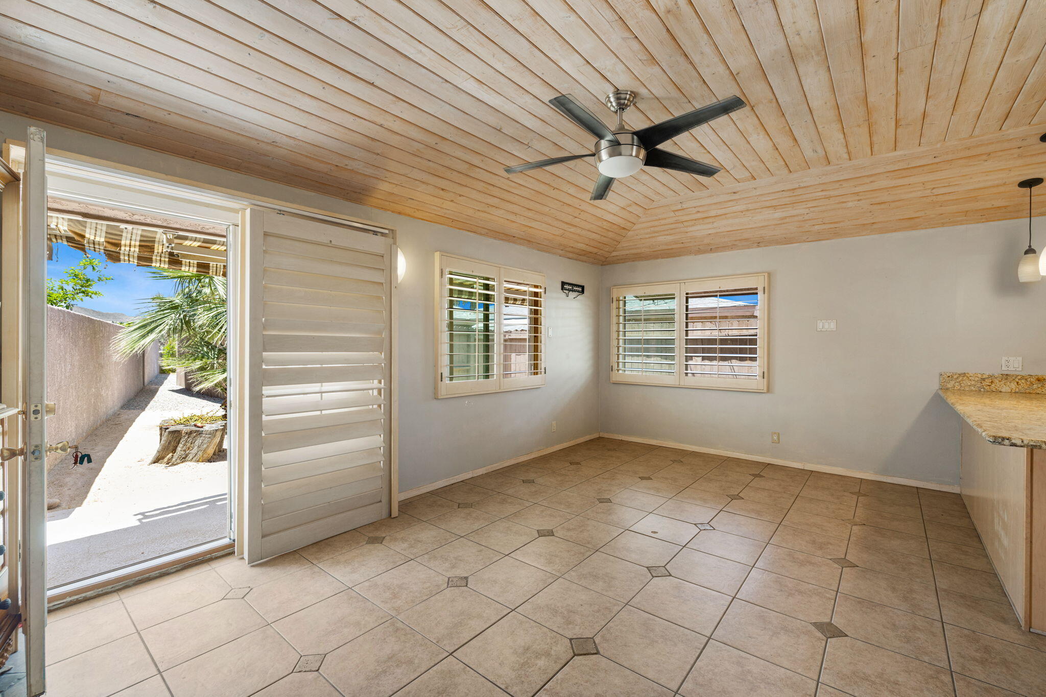 44510 San Carlos Avenue, Unit 4 Palm Desert, CA 92260 - Photo 5 of 12 a view of an empty room and window