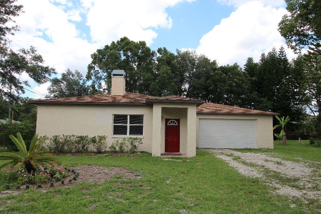 5715 Lake Le Clare Road Lutz, FL 33558 - Photo 1 of 1 FRONT EXTERIOR