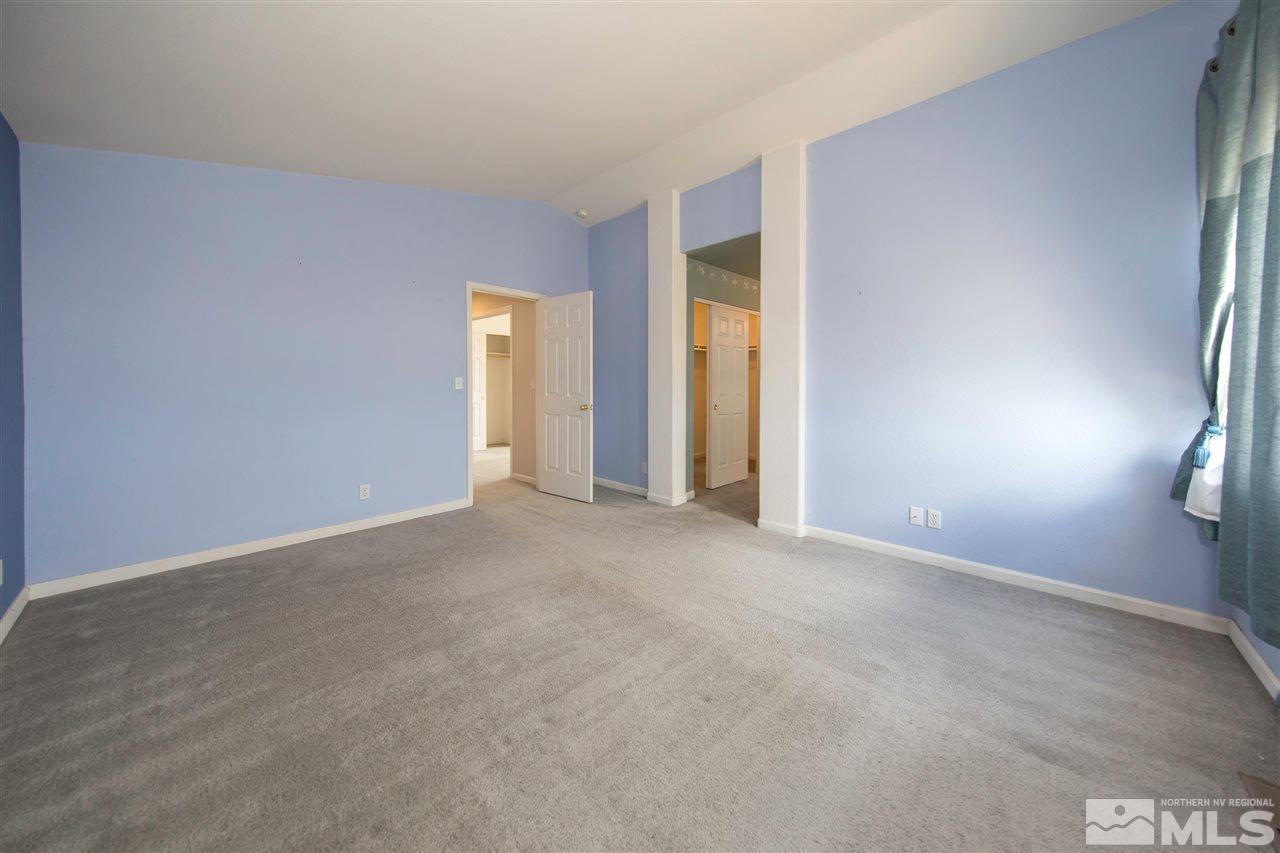 9910 Rock River Drive Reno, NV 89506 - Photo 11 of 24 an empty room with windows