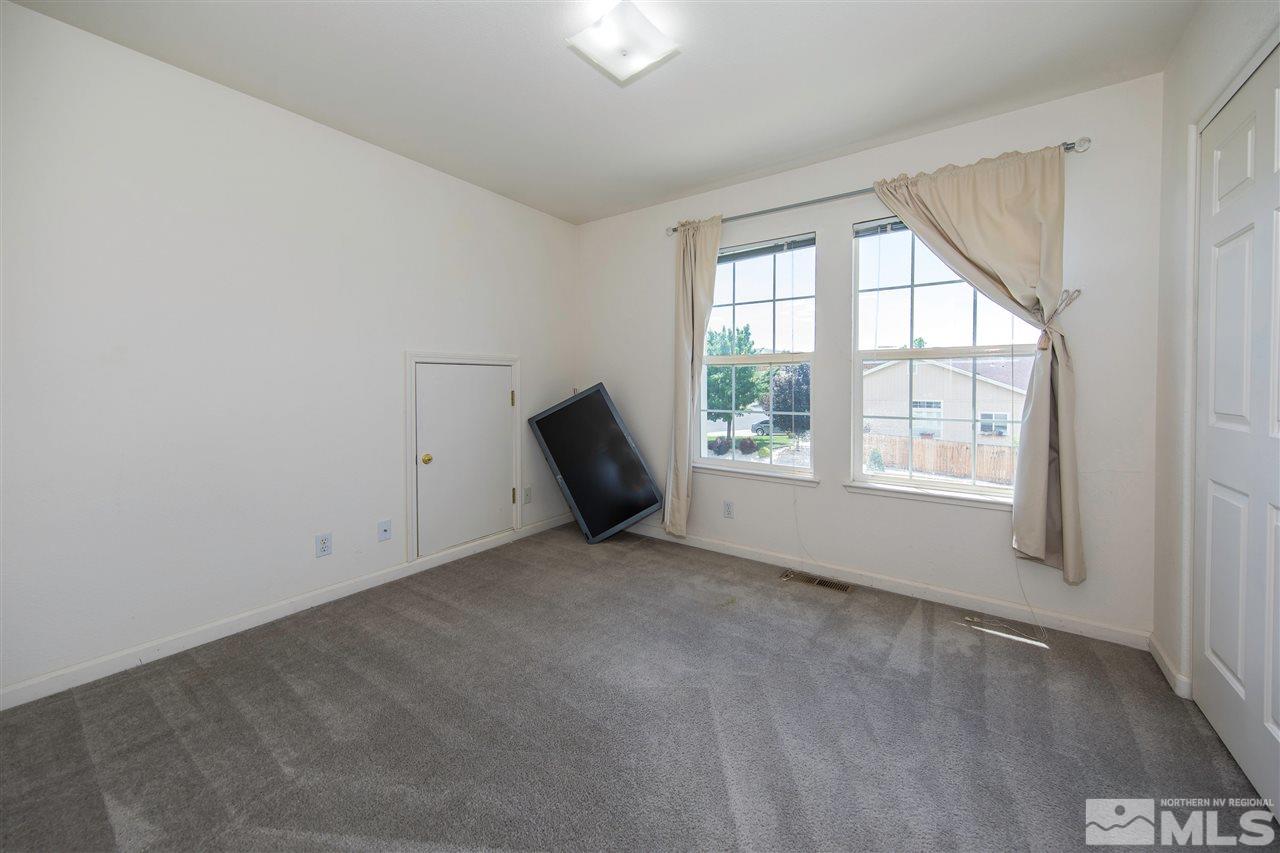 9910 Rock River Drive Reno, NV 89506 - Photo 15 of 24 an empty room with windows