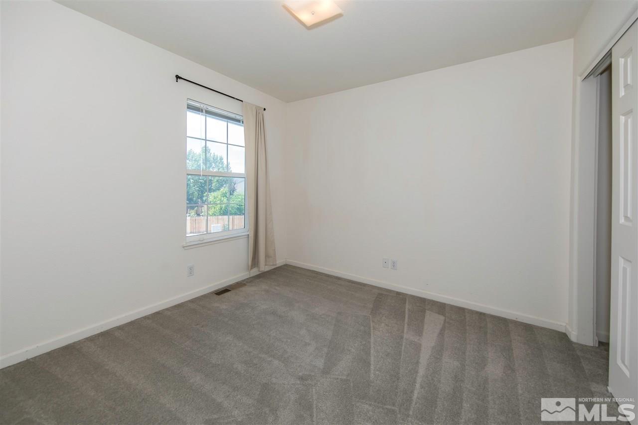 9910 Rock River Drive Reno, NV 89506 - Photo 16 of 24 an empty room with windows