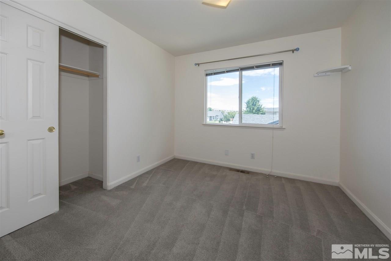 9910 Rock River Drive Reno, NV 89506 - Photo 17 of 24 an empty room with a window