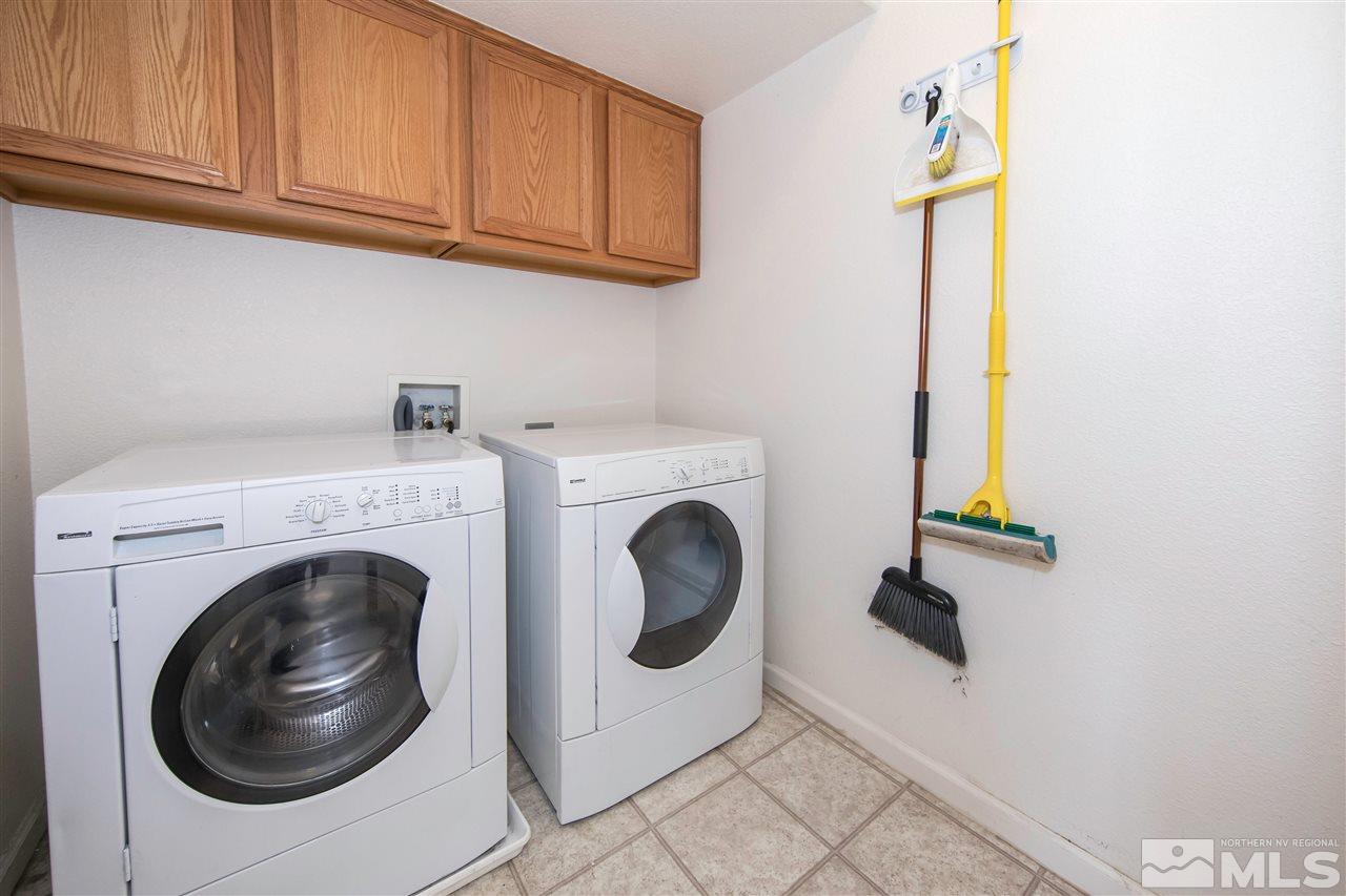 9910 Rock River Drive Reno, NV 89506 - Photo 20 of 24 a utility room with dryer and washer