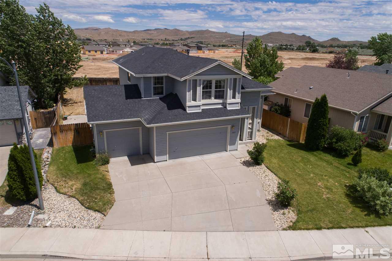 9910 Rock River Drive Reno, NV 89506 - Photo 2 of 24 an aerial view of a house with a yard