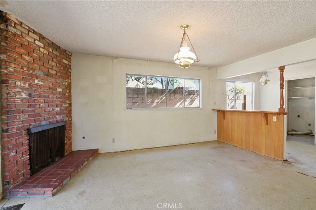 2541 Summershade Drive La Habra, CA 90631 - Photo 12 of 25 wooden floor in an empty room with a fireplace