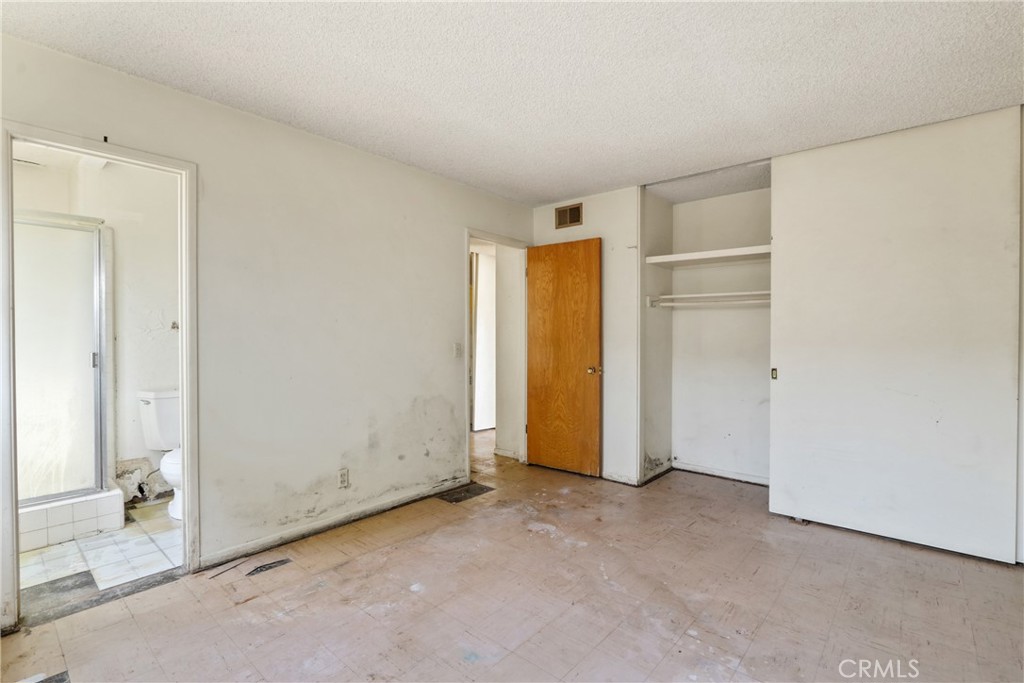 2541 Summershade Drive La Habra, CA 90631 - Photo 19 of 25 an empty room with closet and windows