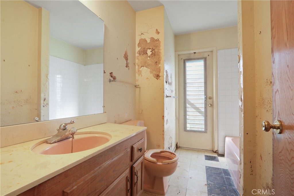 2541 Summershade Drive La Habra, CA 90631 - Photo 21 of 25 a bathroom with a sink and a mirror