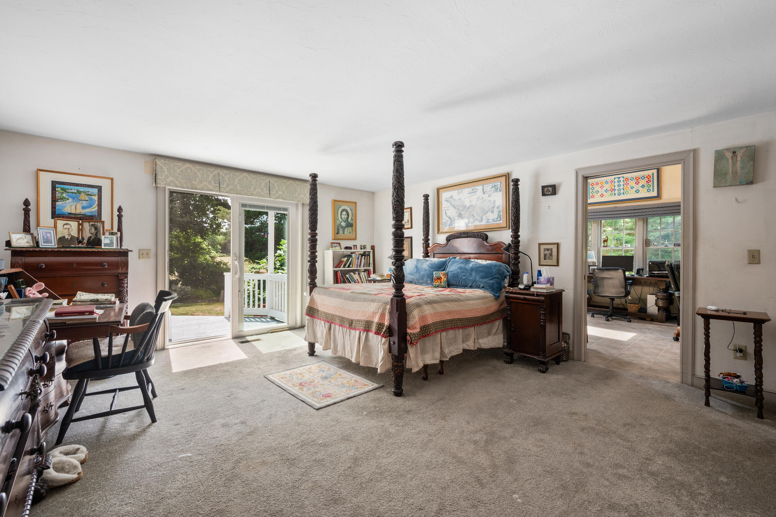 4323 Main Street Barnstable, MA 02630 - Photo 17 of 33 a bed room with a bed and a table chair