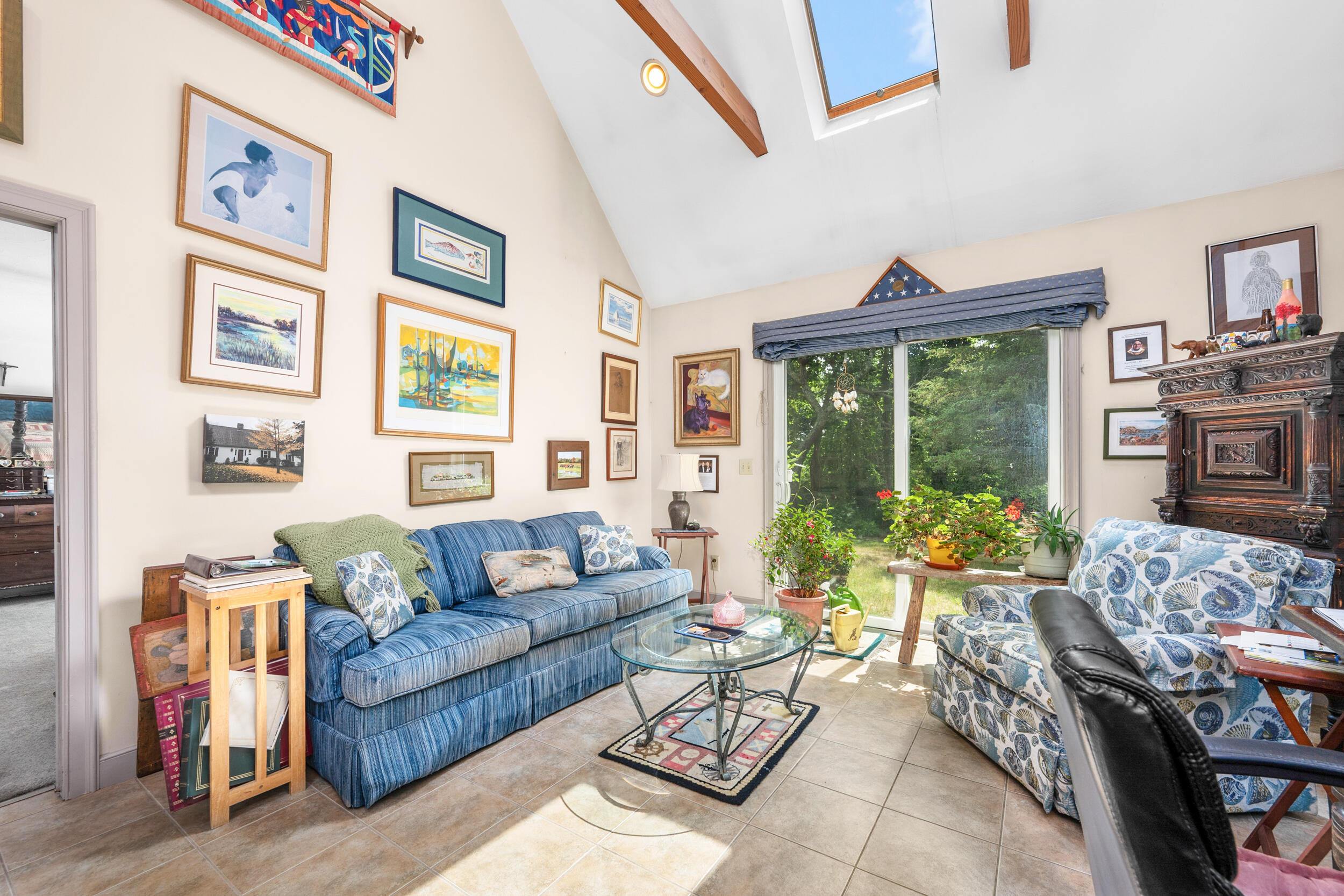 4323 Main Street Barnstable, MA 02630 - Photo 21 of 33 a living room with furniture and a flat screen tv
