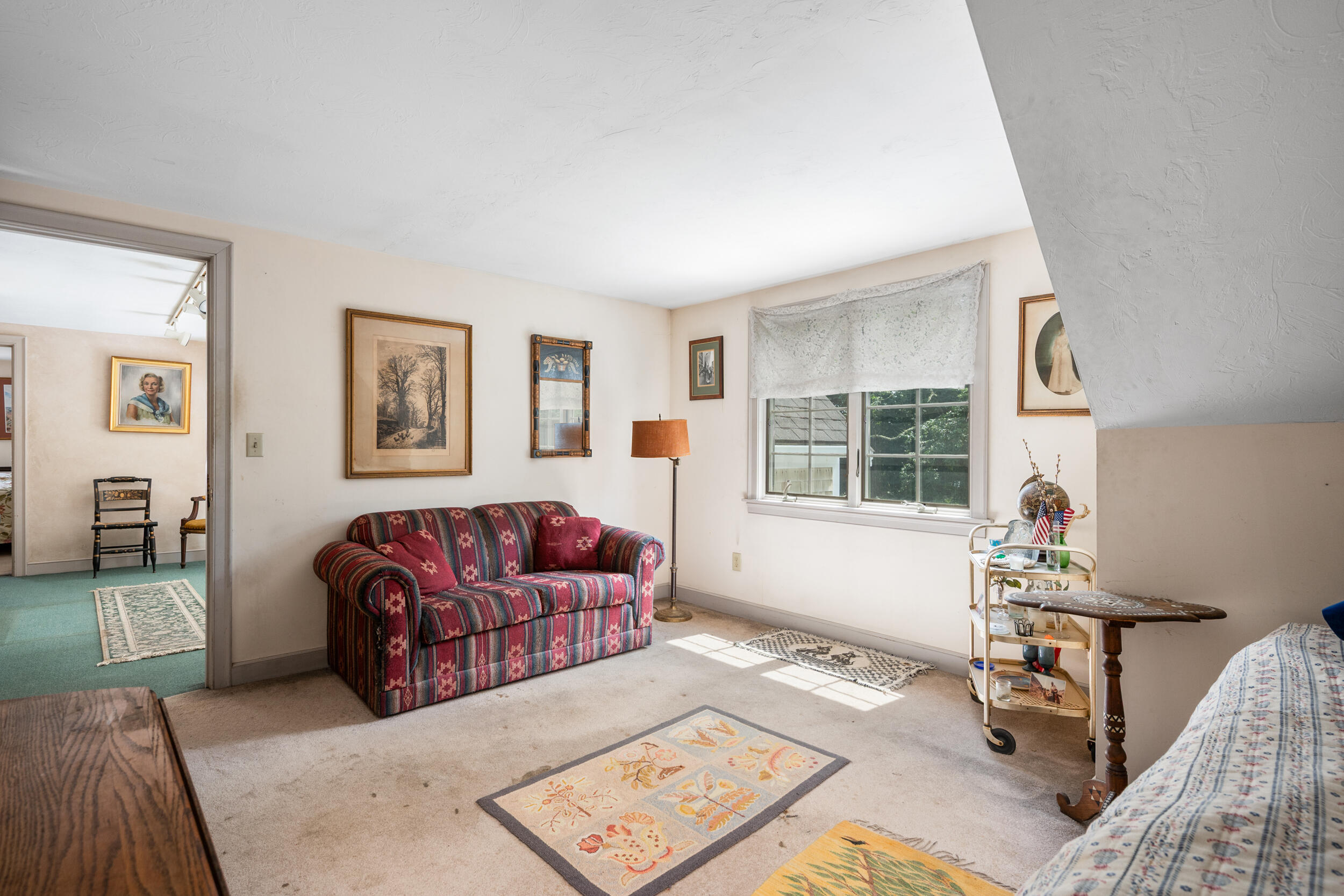 4323 Main Street Barnstable, MA 02630 - Photo 26 of 33 a living room with furniture and a window