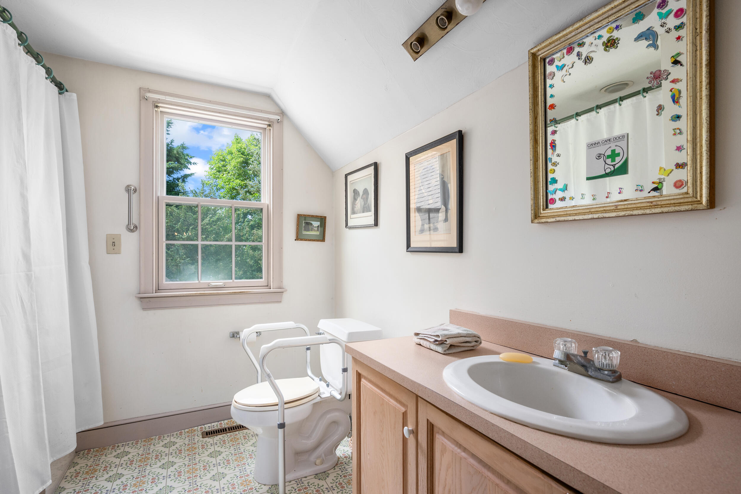 4323 Main Street Barnstable, MA 02630 - Photo 27 of 33 a bathroom with a toilet sink and mirror