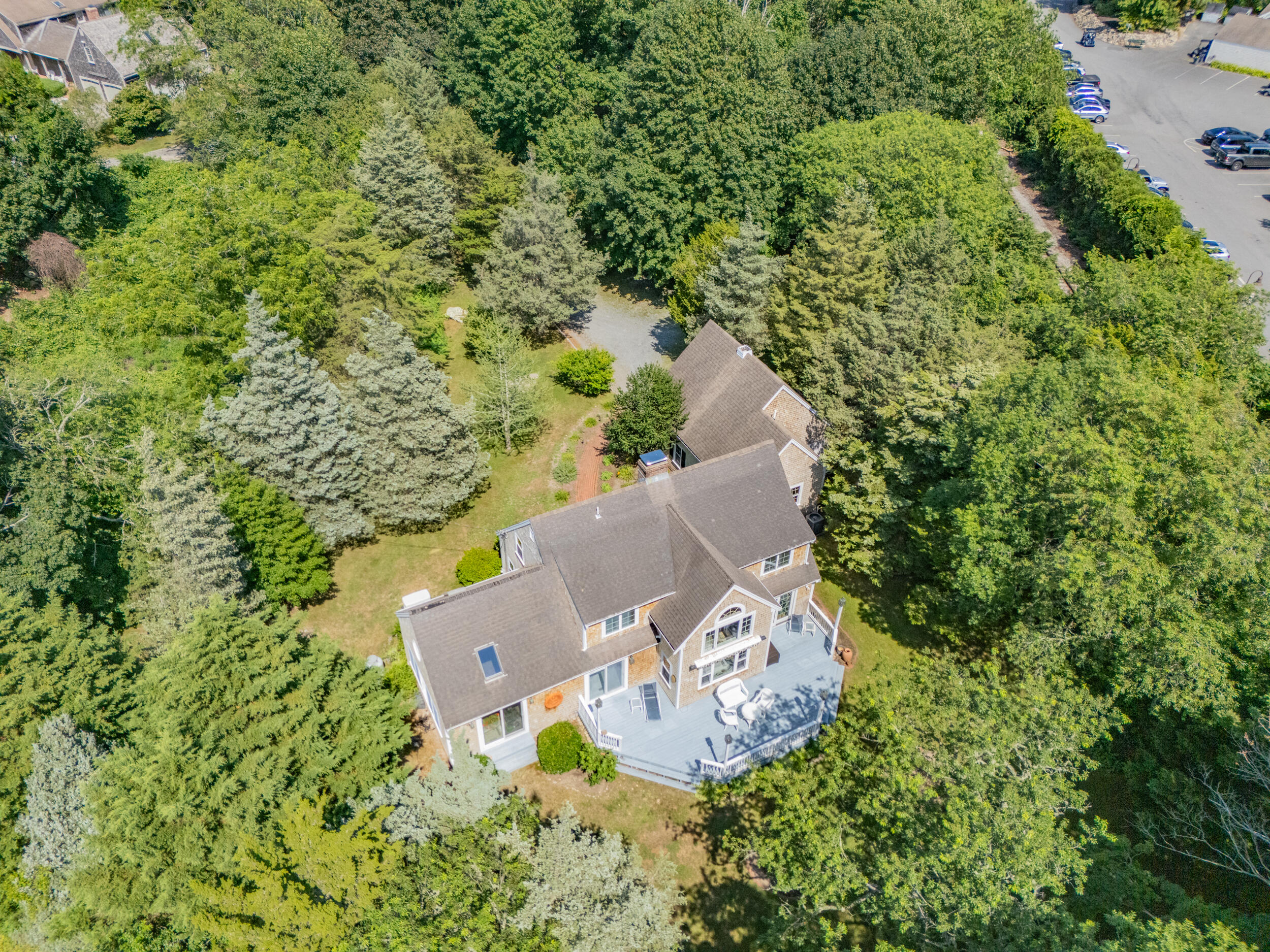 4323 Main Street Barnstable, MA 02630 - Photo 31 of 33 an aerial view of a house with a yard and large trees