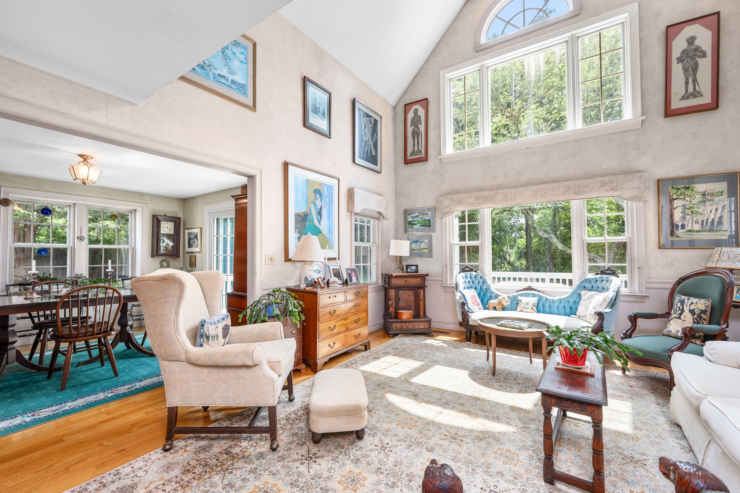 4323 Main Street Barnstable, MA 02630 - Photo 9 of 33 a living room with furniture and a floor to ceiling window