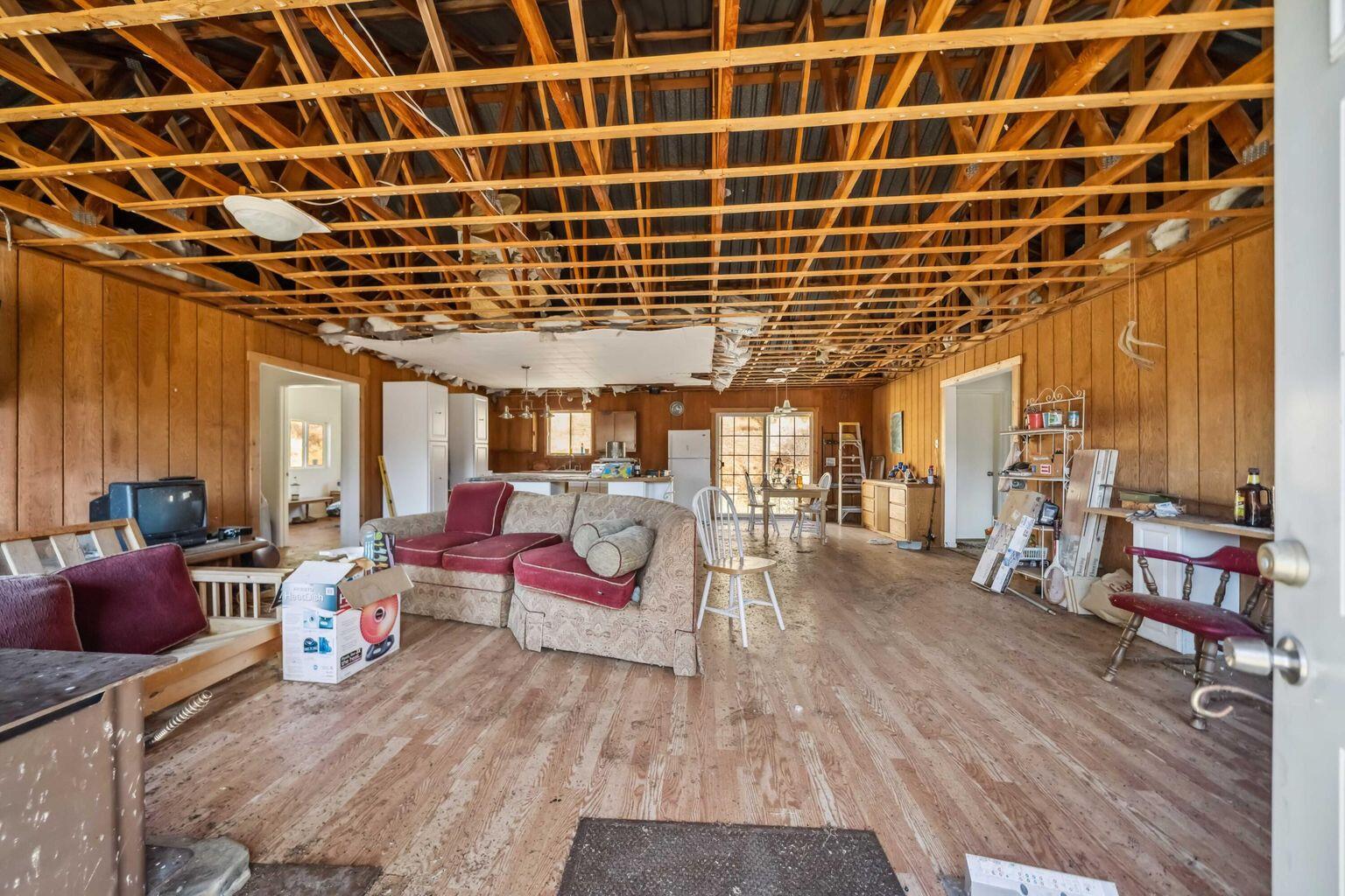0 Vestal Road Platina, CA 96076 - Photo 8 of 34 a living room with furniture a rug and white walls