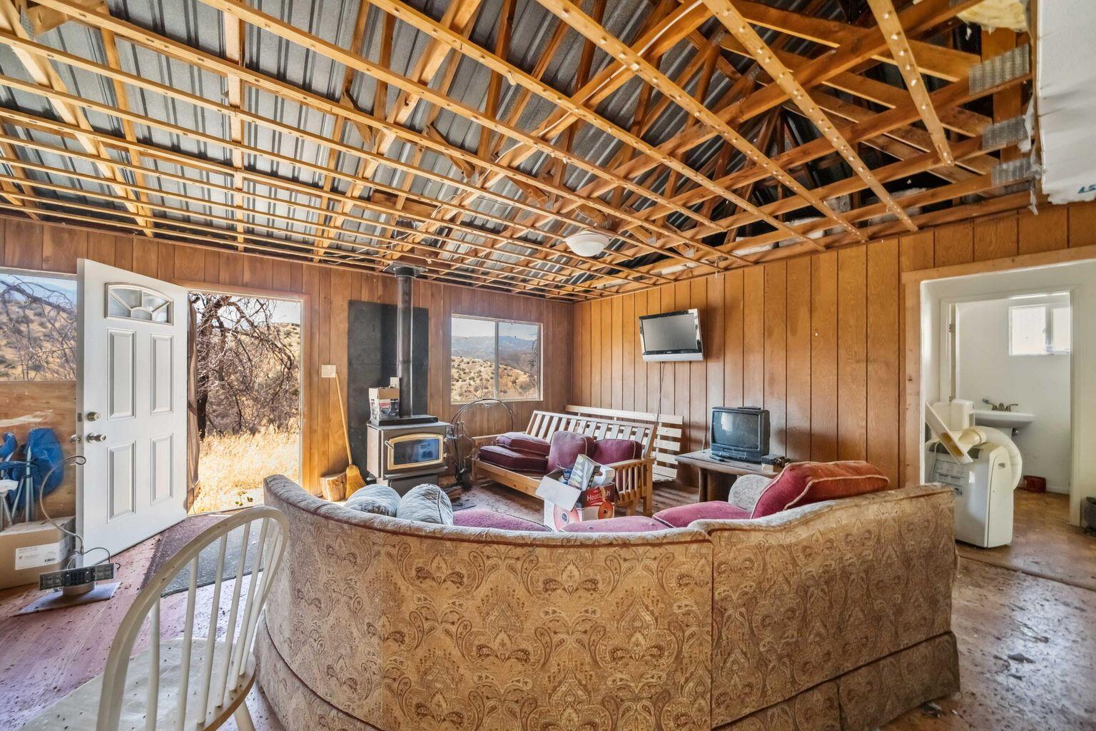 0 Vestal Road Platina, CA 96076 - Photo 9 of 34 a living room with furniture and a large window