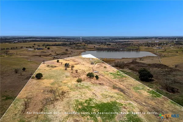 a view of an ocean and city