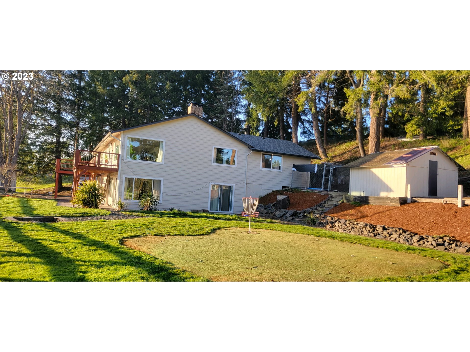 85903 Bailey Hill Road Eugene, OR 97405 - Photo 2 of 27 a front view of a house with a yard