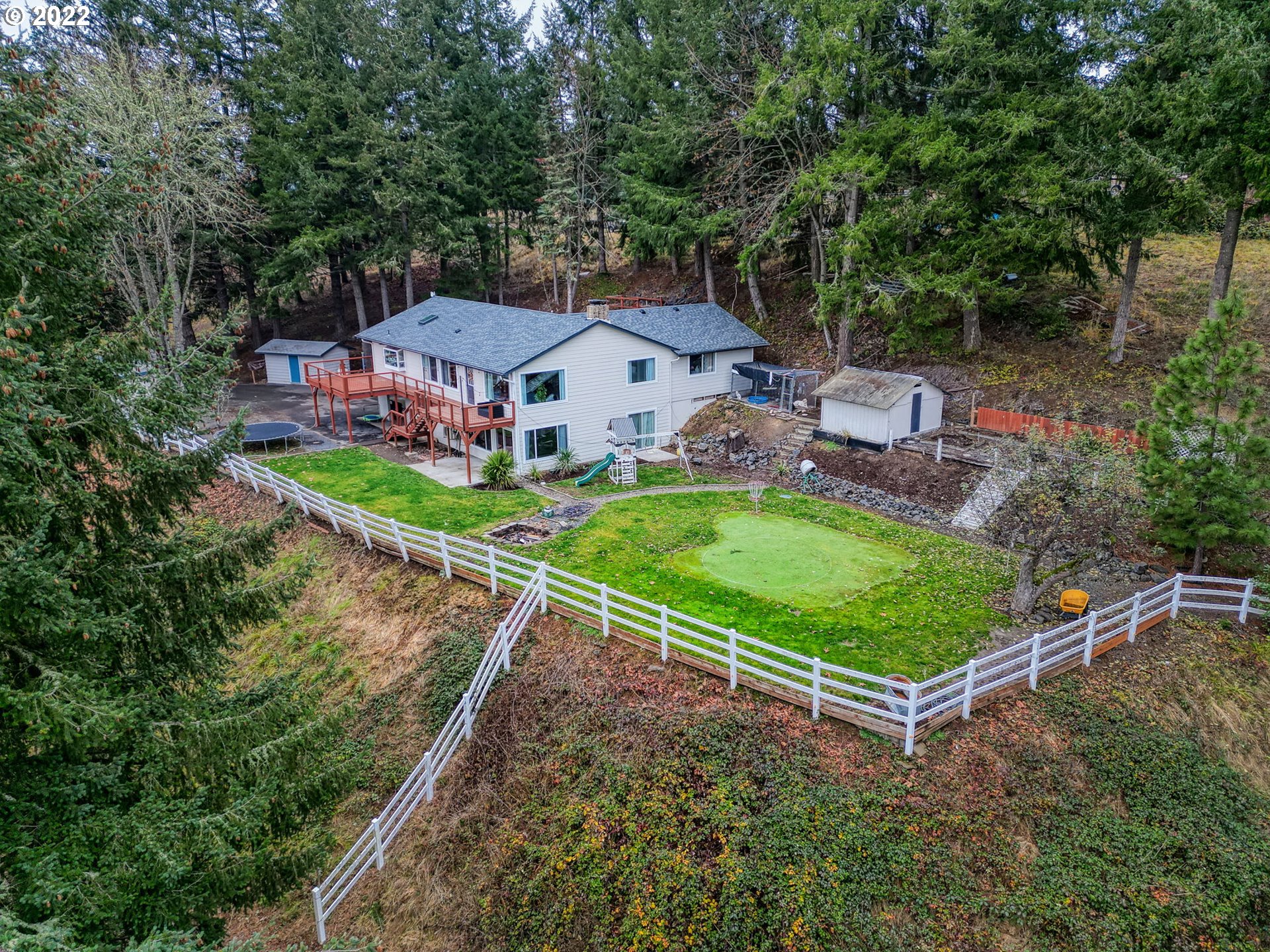85903 Bailey Hill Road Eugene, OR 97405 - Photo 27 of 27 an aerial view of a house with a garden and trees