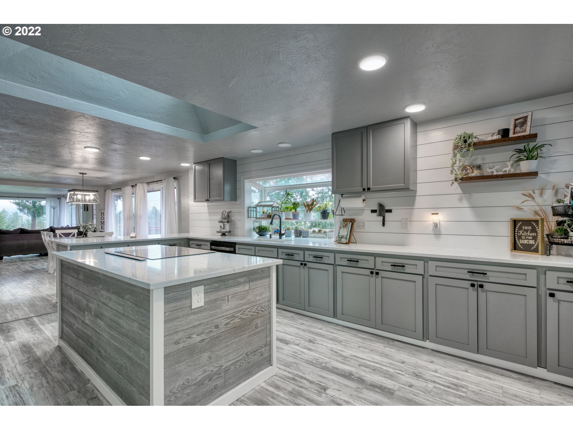 85903 Bailey Hill Road Eugene, OR 97405 - Photo 3 of 27 a kitchen with stainless steel appliances granite countertop a sink stove and cabinets