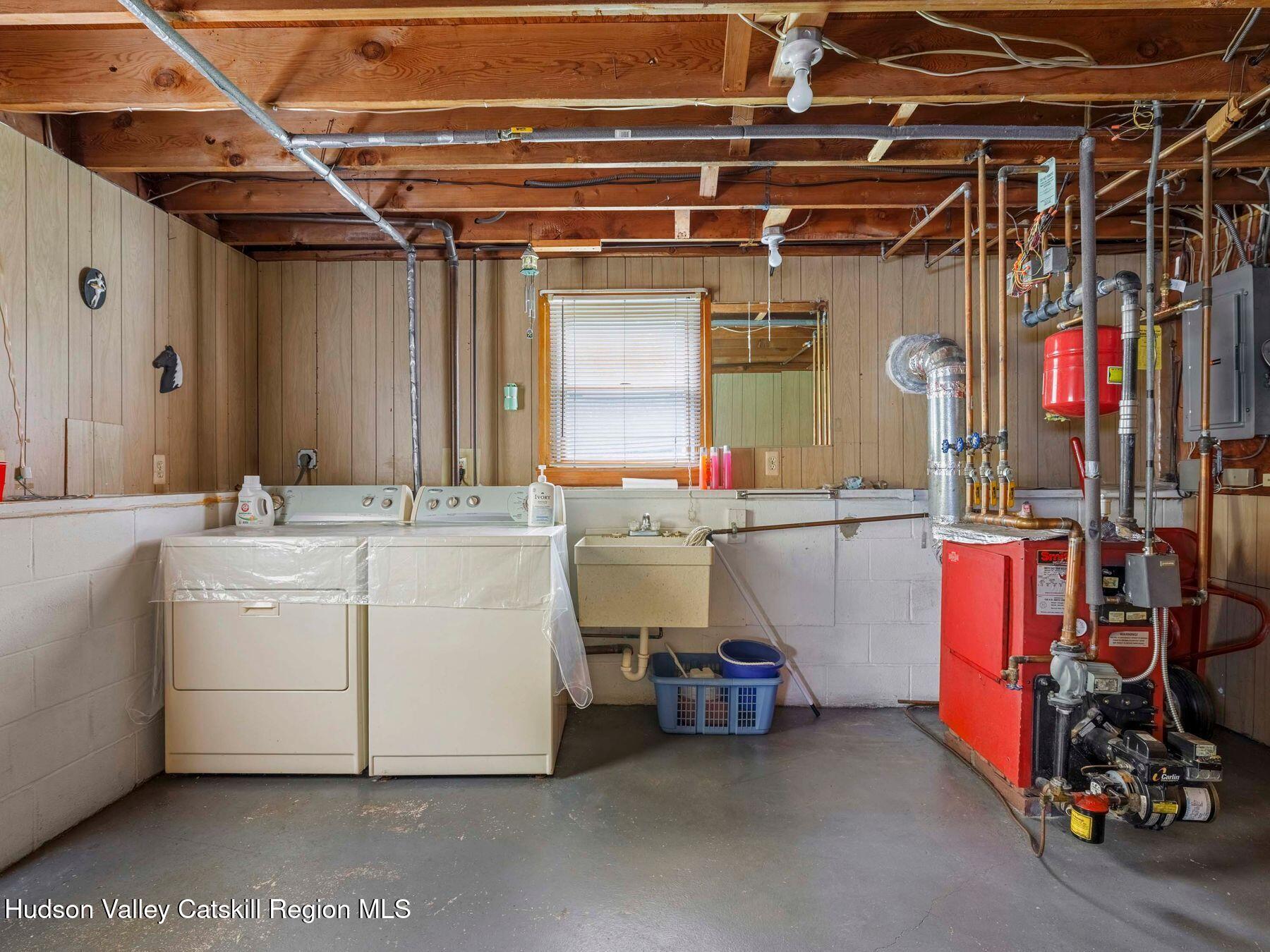104 New Paltz Road Highland, NY 12528 - Photo 31 of 43 a utility room with dryer and washer