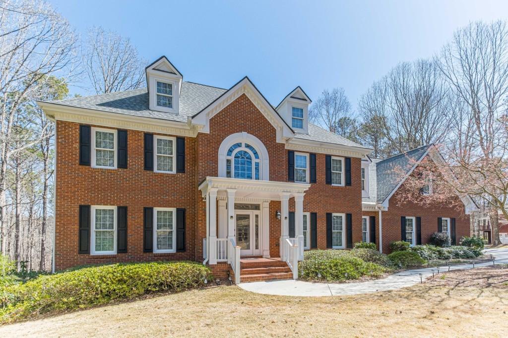 3751 Apalachee Ridge Monroe, GA 30656 - Photo 1 of 1 a front view of a house with a yard