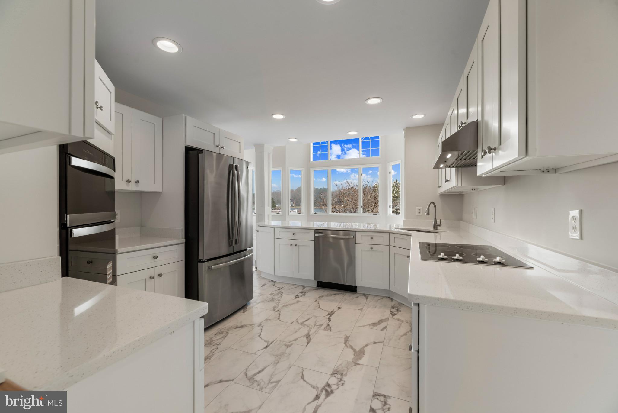 5929 Deale Beach Road Deale, MD 20751 - Photo 9 of 58 Kitchen featuring light stone counters, light marb