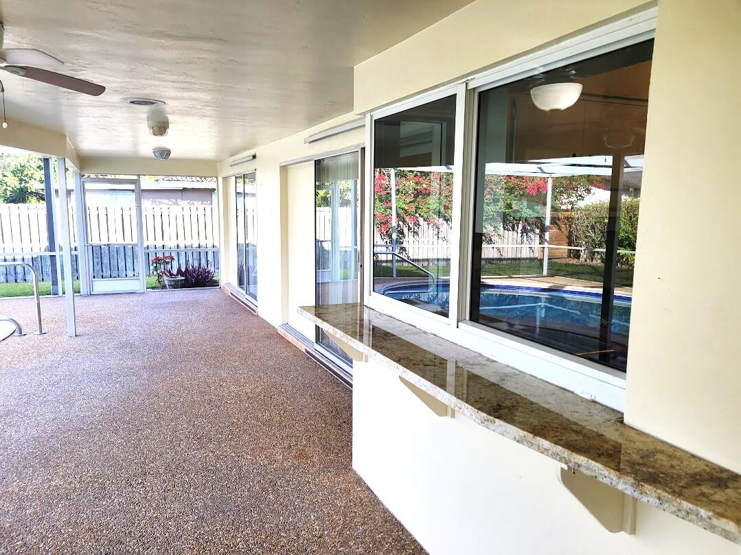 1927 Sharon Street Boca Raton, FL 33486 - Photo 13 of 23 20250128_153540 Lanai Passthru updated