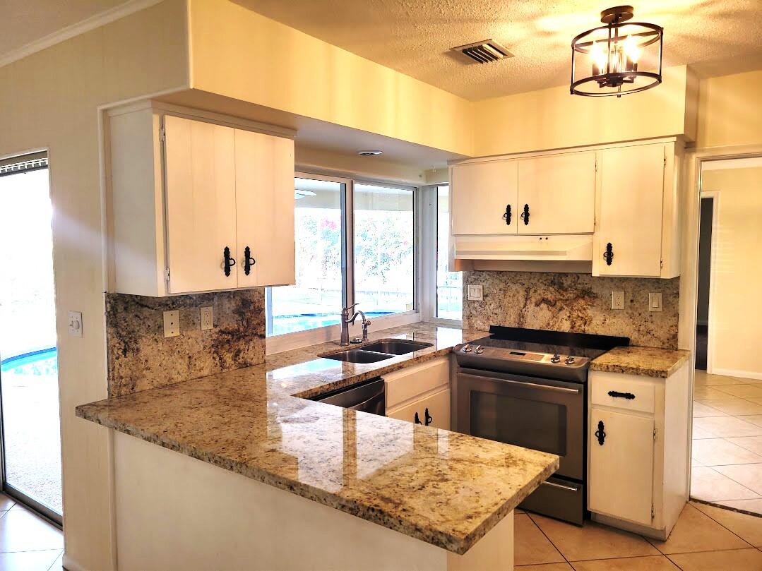 1927 Sharon Street Boca Raton, FL 33486 - Photo 10 of 23 20250128_153321 kitchen updated