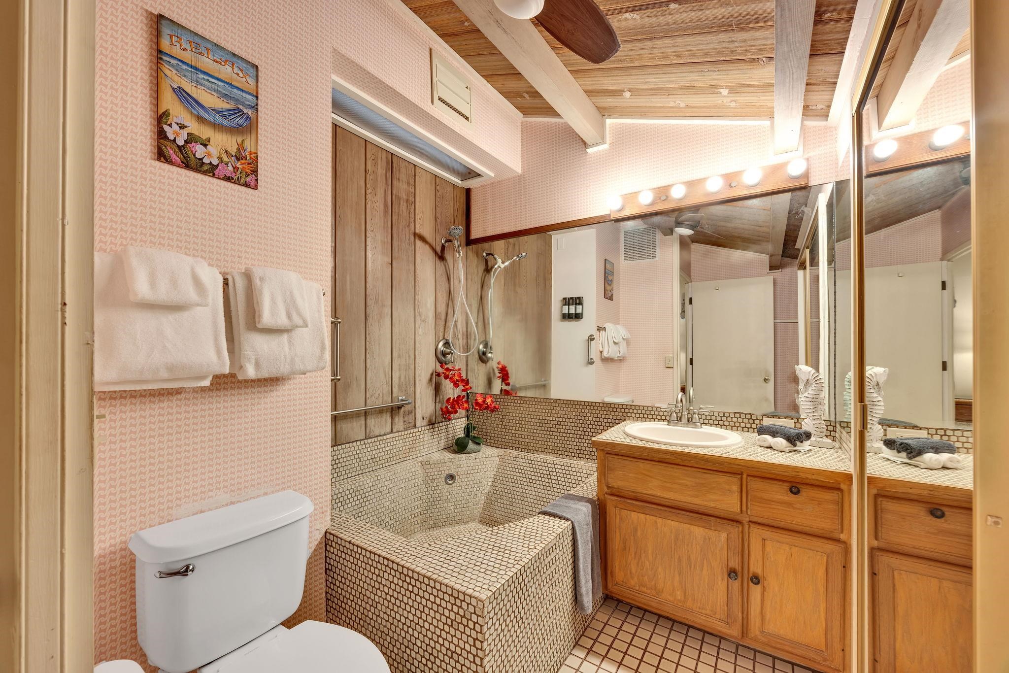 3691 Lower Honoapiilani Road, Unit 211 Lahaina, HI 96761 - Photo 24 of 47 a bathroom with a sink double vanity and a mirror